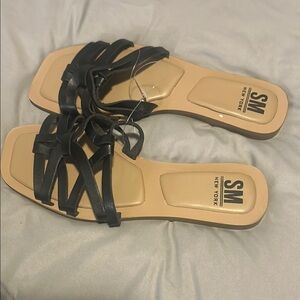 SM New York Black and Tan Sandals with Crisscross Straps